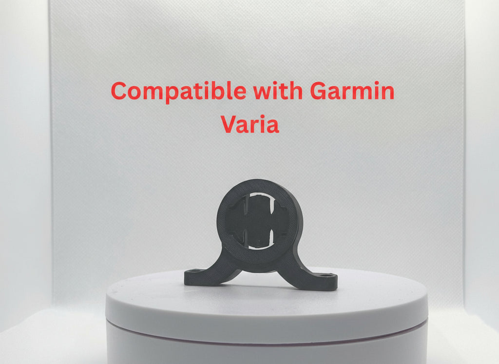 Black device on a white platform with 'Compatible with Garmin Varia' text above.